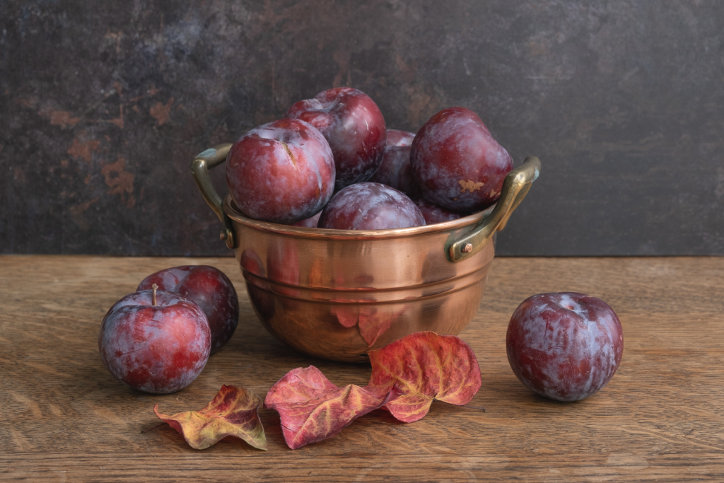PLUMS IN COPPER COLANDER by Jane McLeod Class